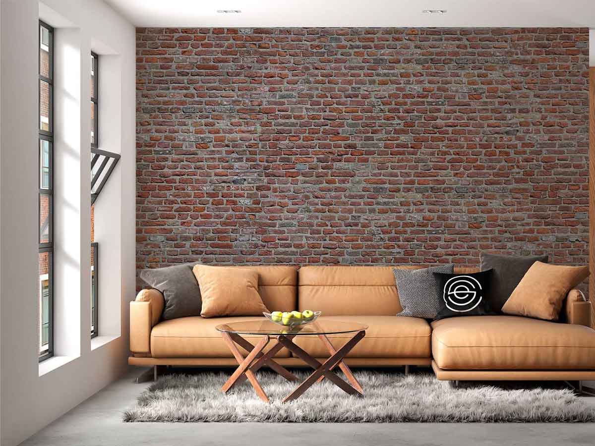 Carta da parati realistica con effetto muro di mattoni, conferisce un look urbano al soggiorno
